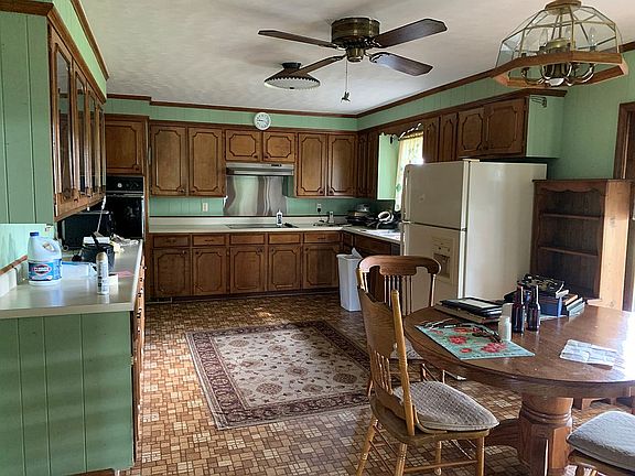 Kitchen has door to patio