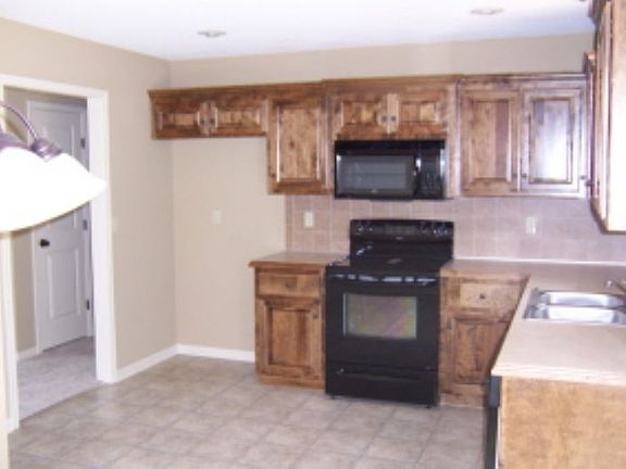 4th image of 509 NW Fox Hollow Ln