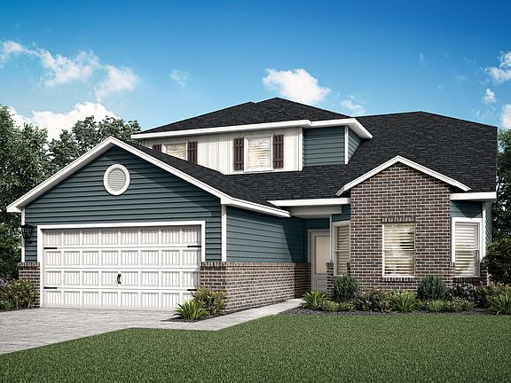 The Cypress is a beautiful two-story home with siding and brick and front yard landscaping