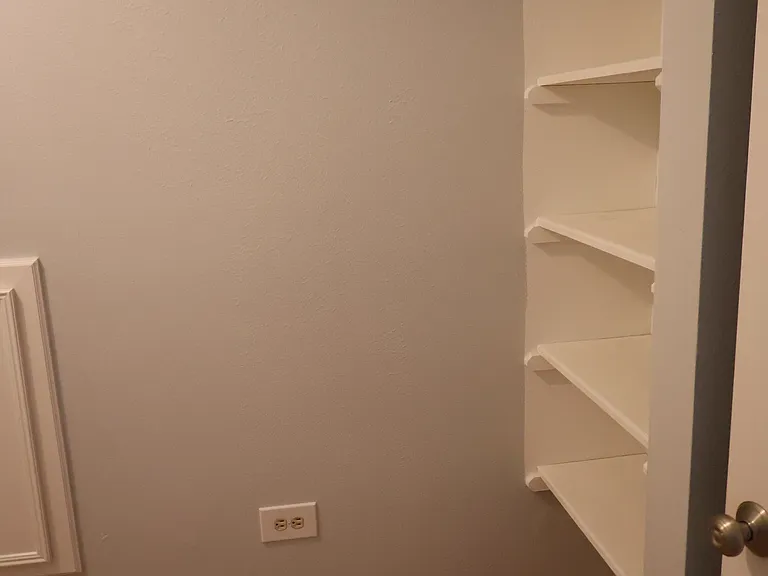 Extra storage area comes complete with shelving.