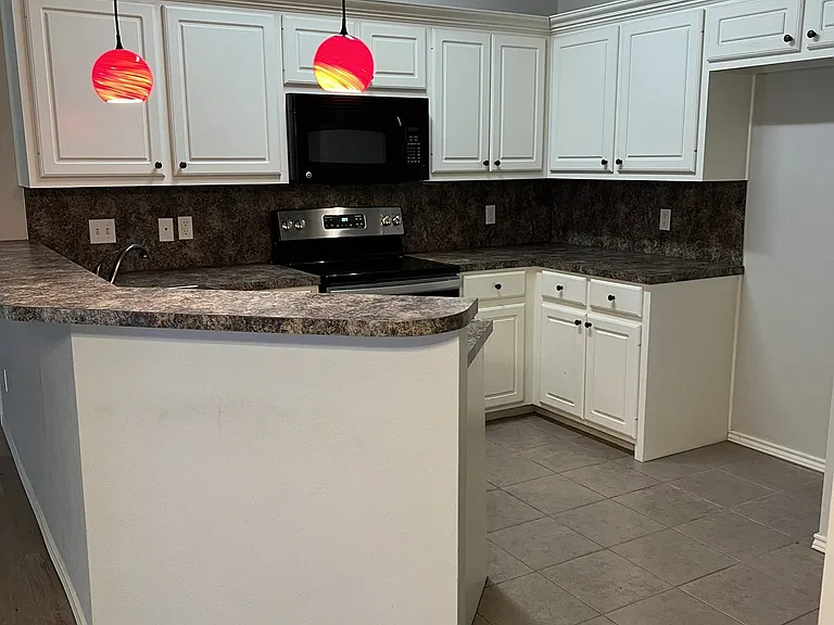 Kitchen with Bar and Built-ins