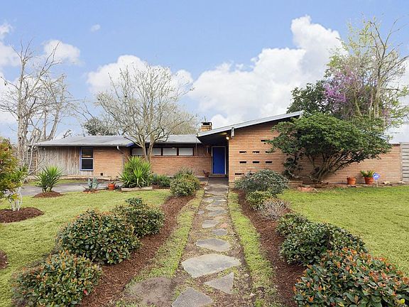 Designed by Lucian Hood & nestled on a gigantic 18k sq ft lot per HCAD, great mid-century modern jus