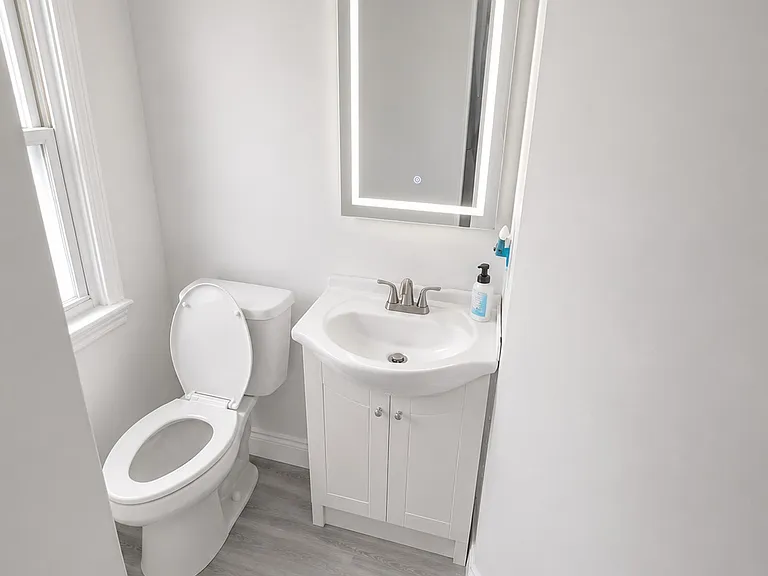 Bathroom 
(AI GENERATED PHOTO OF ILLUSTRATION OF WHAT IT WILL LOOK LIKE AFTER RENOVATIONS) 
Will upload actual pictures once renovations are completed.