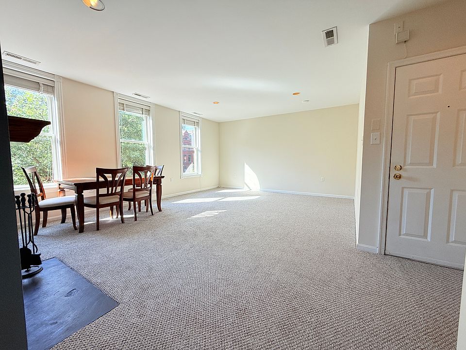 Living Room - three big windows face Vermont Ave.