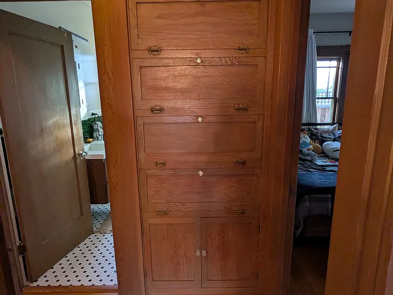 Hallway with built-in closet
