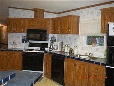 4th image of 15091 Portage St Lot 32