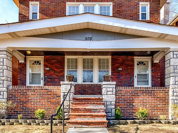 Covered front porch with new landscaping!