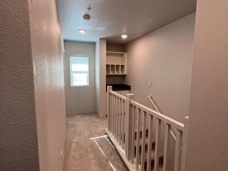 Upstairs hallway with drop zone