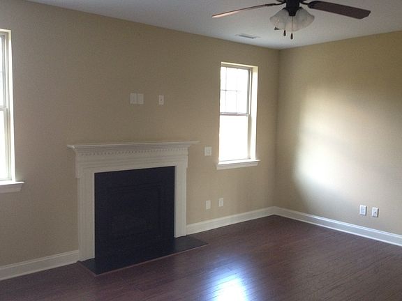 Family Room off of the kitchen offers a Fireplace, hardwood