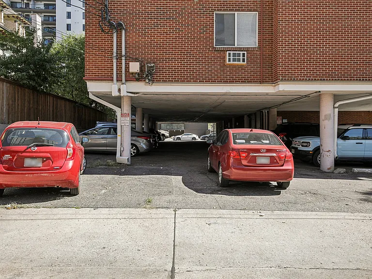 Assigned parking, west end of carport