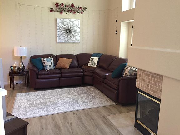 Gas Fireplace, new vinyl flooring. Furniture for visual only, not included.