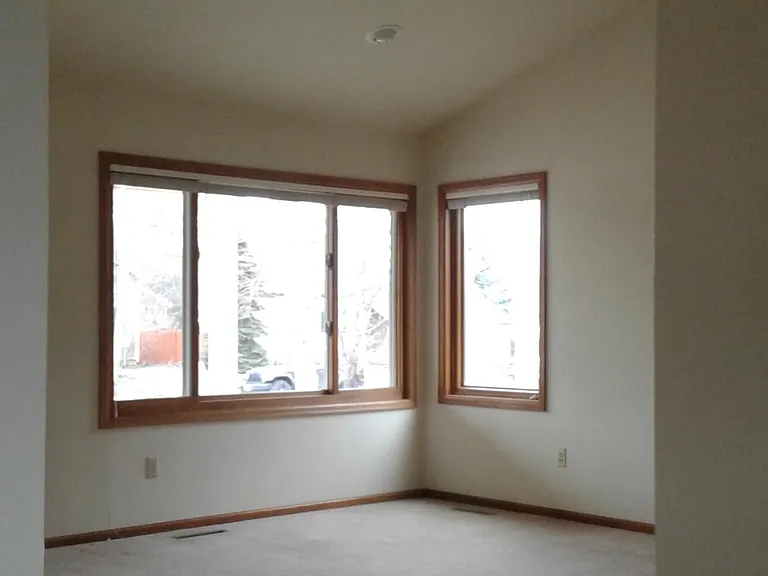 Additional living room sitting area (not family room) with Anderson windows.