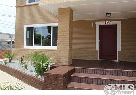 3rd image of 241 E 1st St