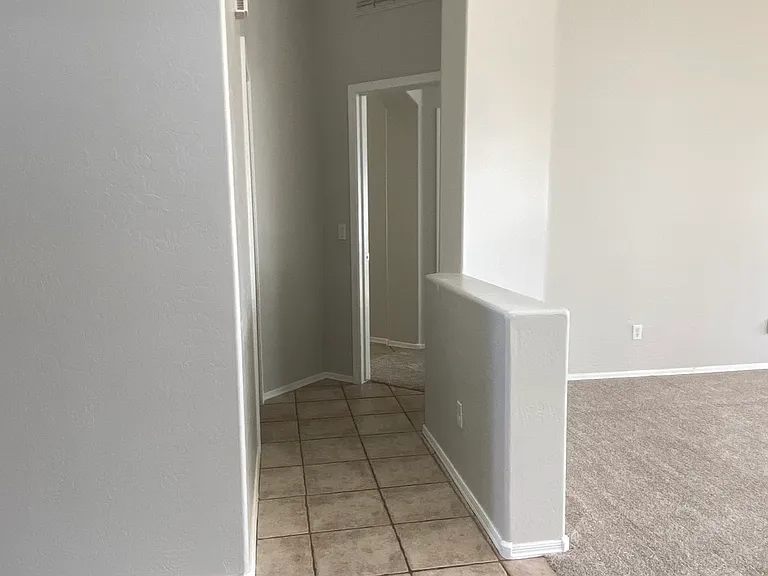 Halway to Primary Bedroom and Bath