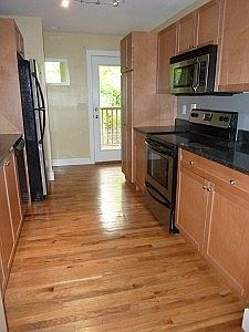 Galley style kitchen includes all appliances...