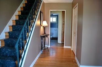 Wide entrance foyer is elegant and welcoming