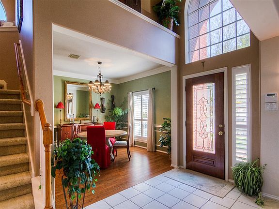 Two story entry welcomes guests