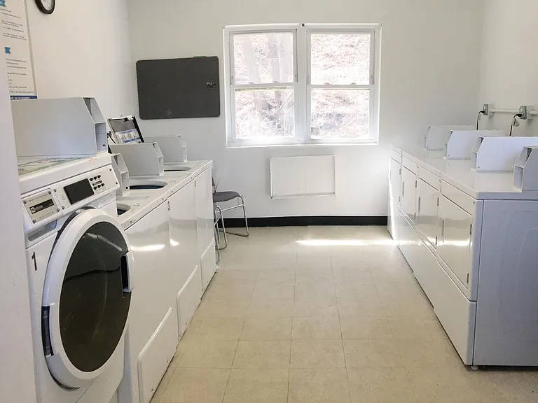 laundry room steps from the unit.