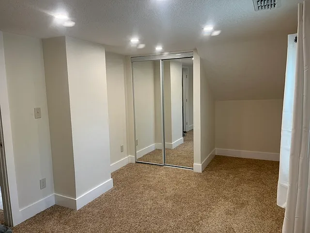 Upstairs bedroom #2 can accommodate a queen mattress and bedroom furniture.