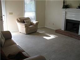 This Living Room is great w/Hardwood entry, Fireplace with mantle.