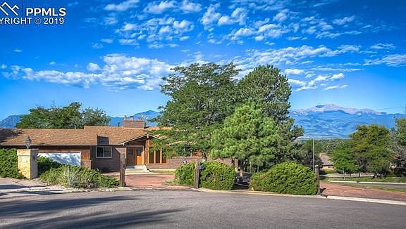Large Paved, Circular Driveway. Expansive Pikes Peak and Mountain Views!