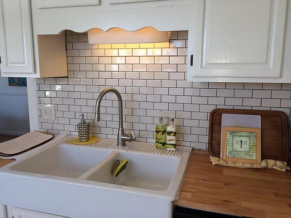 Kitchen with farm sink.
