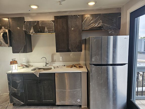 kitchen (new construction still has plastic wrap}