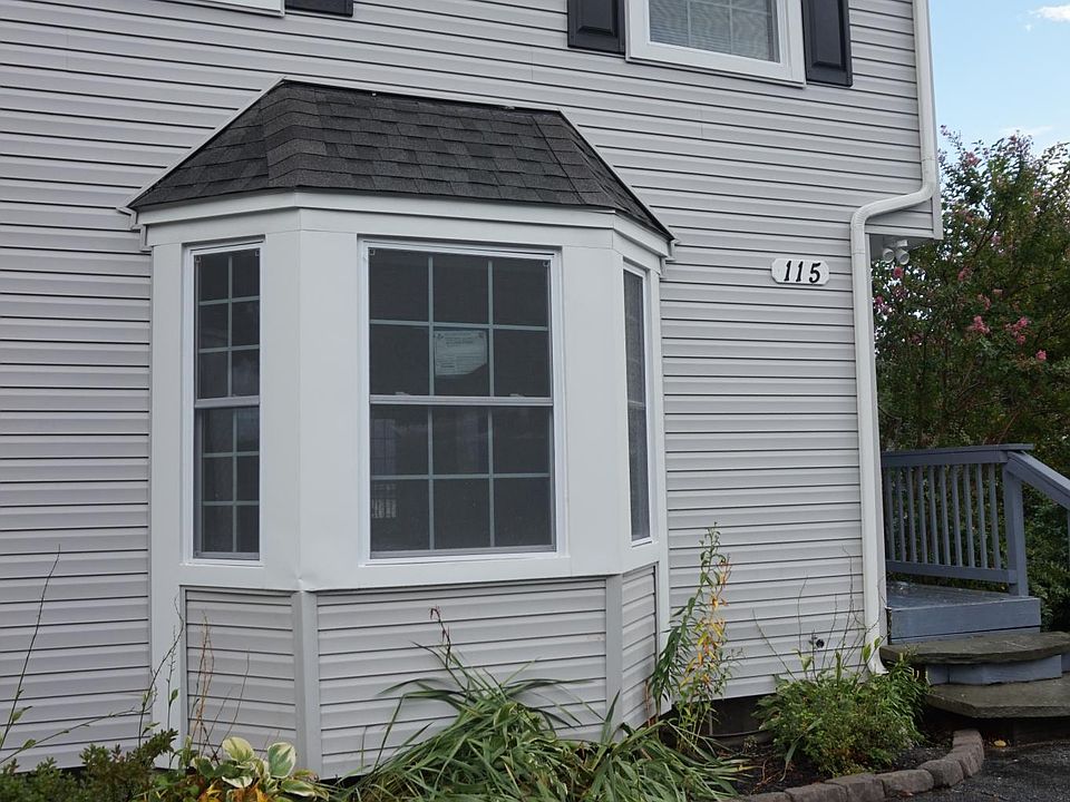 Front of house with parking for up to 3 cars.