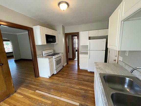 Refrigerator, microwave and gas stove included.