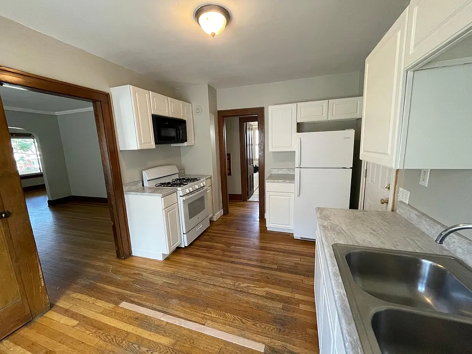 Refrigerator, microwave and gas stove included.