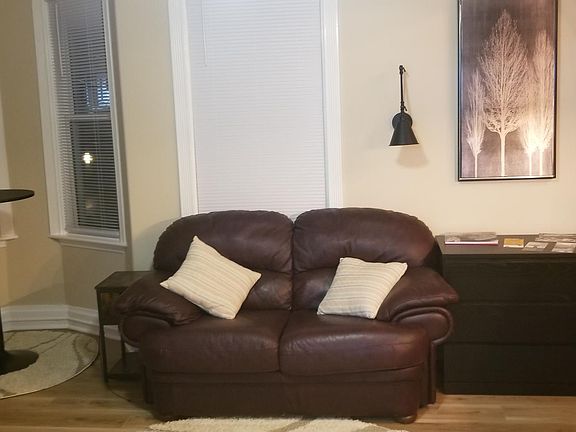 Couch, Turret w/ table & stools & small set of drawers for storage.