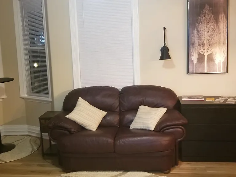 Couch, Turret w/ table & stools & small set of drawers for storage.