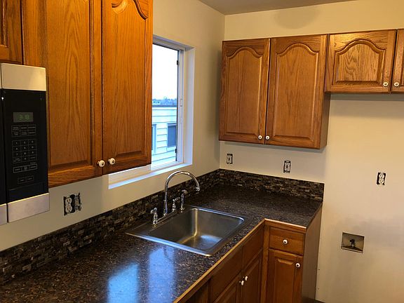New stone backsplash. New Frigidaire refer not pictured but beautiful.