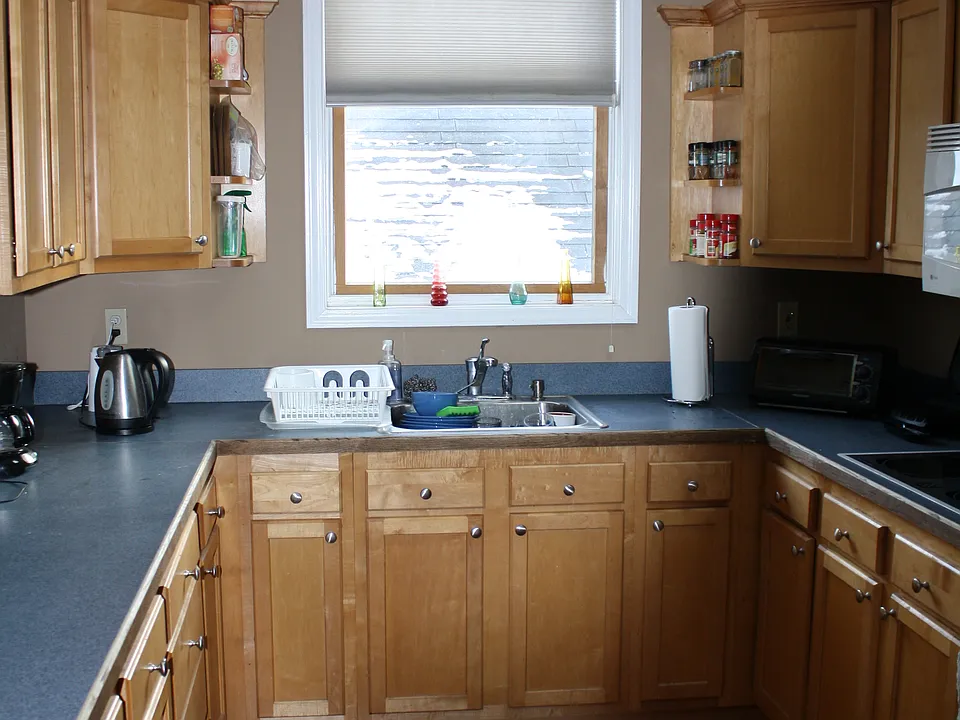 Large window with lots of cabinet space