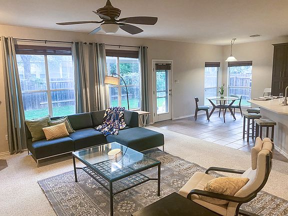 Large living room with plenty of light.