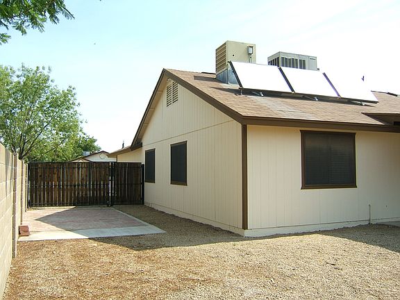 Paved RV parking w/gate, water & electric