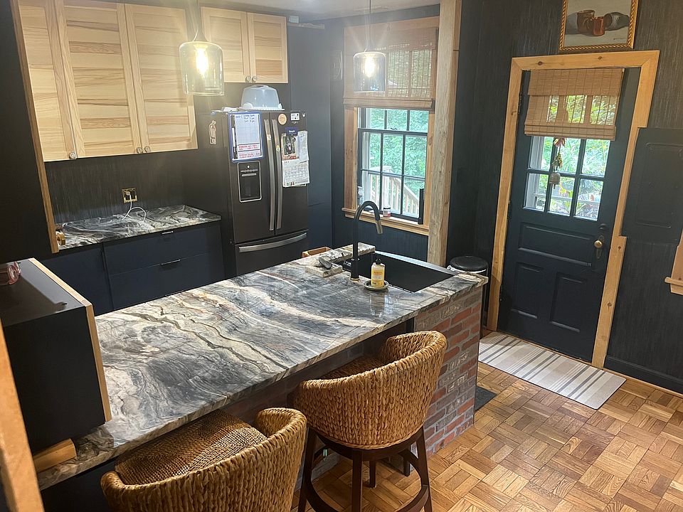 Large kitchen for entertaining and room for dining table.