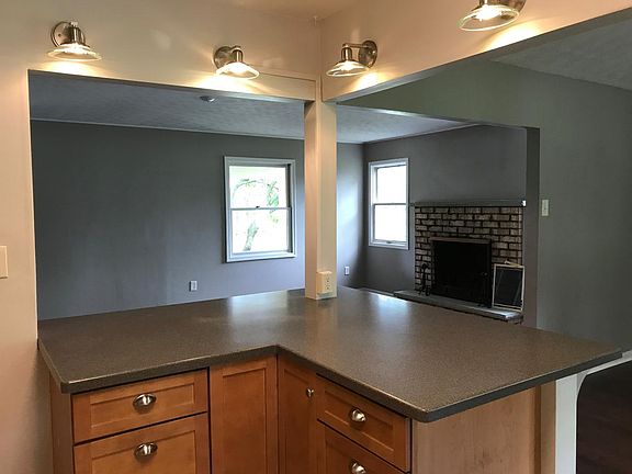 Kitchen Island looking into living room, note the corner pantry cabinet, there's actually two!!!
