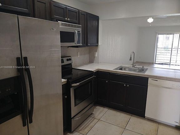 5th image of 911 NE 209th Ter APT 204