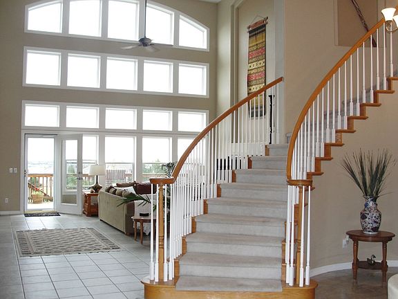 Grand entrance with 20' ceilings and tons of natural light