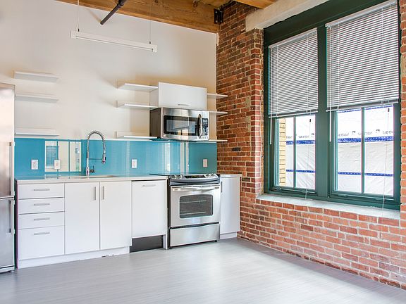 Cohesive Kitchen and Open living area