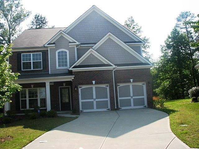 Like new Ryland home in Villages at Brookmont. Brick front and hardi-plank