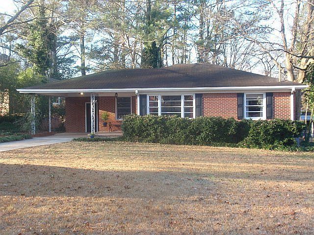 All brick house on a large corner lot