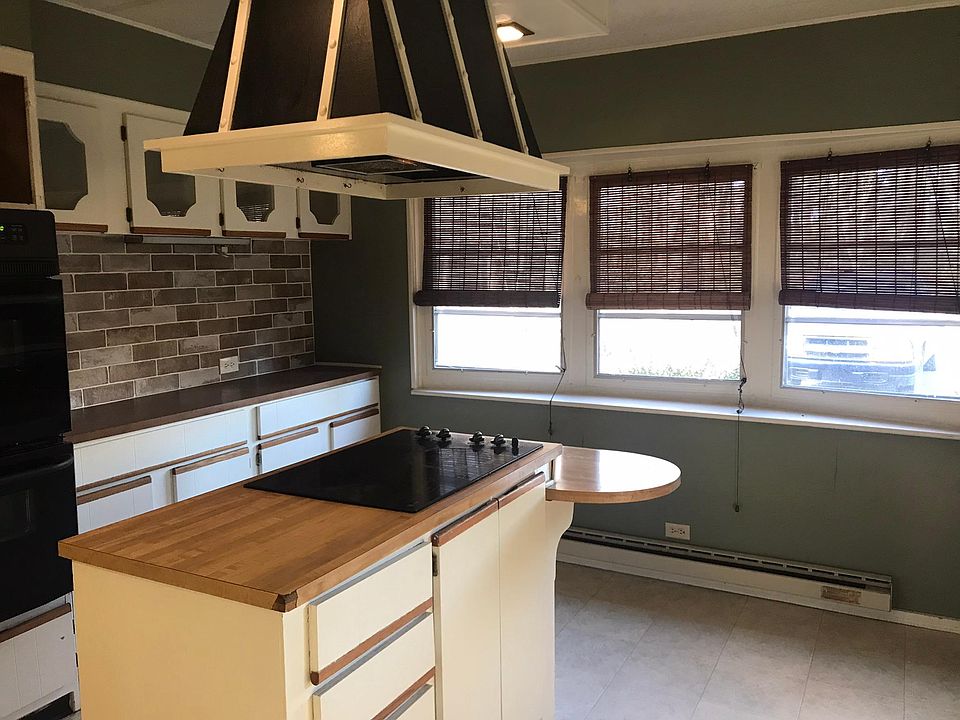 Kitchen - stove top, dishwasher, refrigerator and double oven