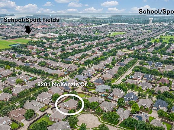 Aerial overview of property''s location close to schools, parks, and sports fields