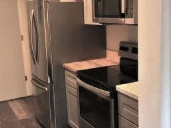 Brand new stainless-steal appliances add this gorgeous kitchen.