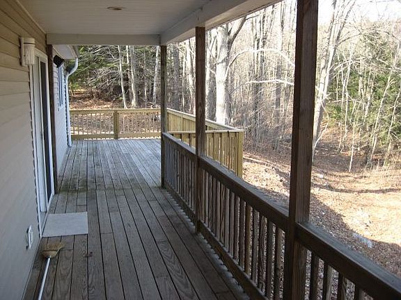 Covered deck overlooking stream!