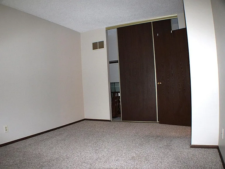 Upstairs back bedroom.