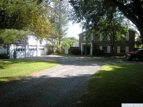 This 1920 period brick Hudson River home has a long driveway for very good privacy.