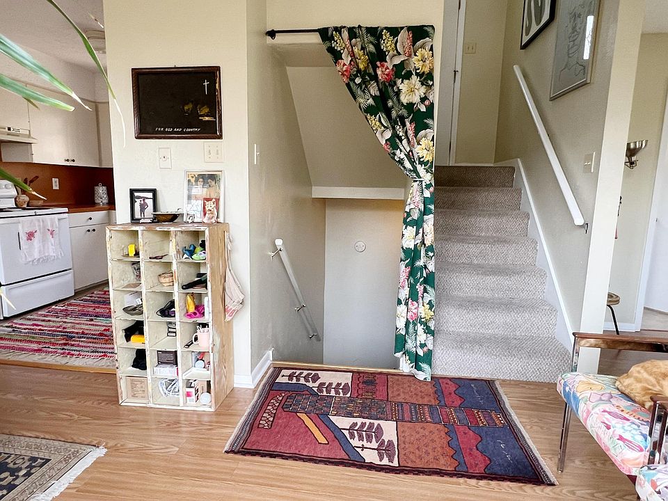 View from main level. Downstairs to garage/workspace/storage